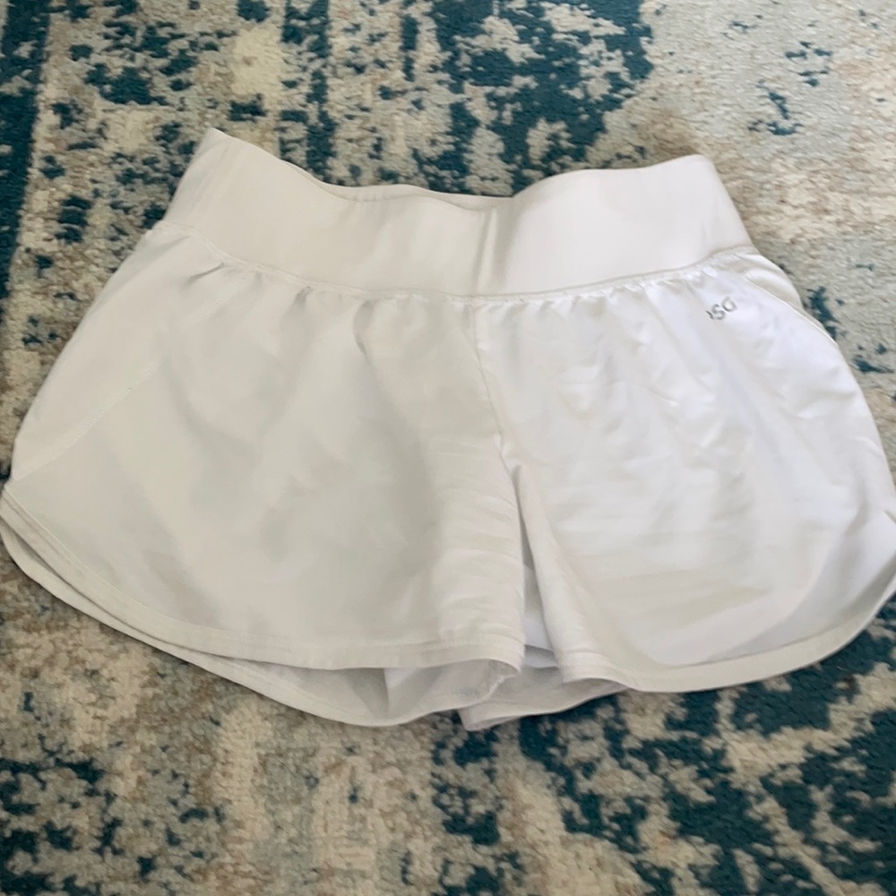 Kids white shorts. never worn